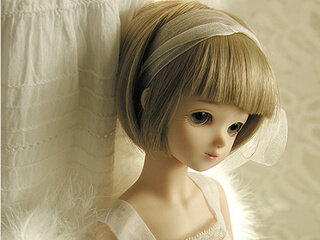 Cute sad doll